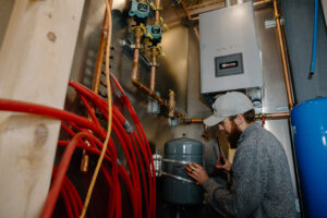 Alta boiler expansion tank installation in progress