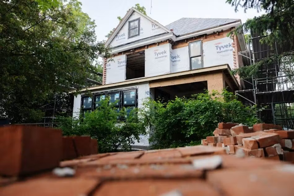 Outside street view of house during renovation