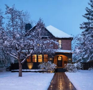 Street view of finished house in winter with heated sidewalk